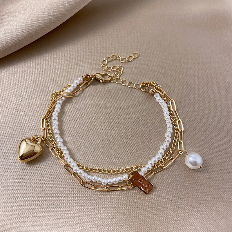 d87e5171-9e87-403b-aaee-aeca0cd12fe1.jpg Alloy Beads Retro Simple Double Layers Loving Heart Pearl Bracelet - Image 4